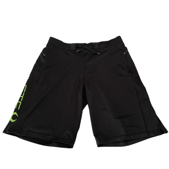 Hylete men’s Size Medium athletic shorts. ‎ 
Color: black with green logo - Picture 2 of 4